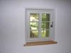 Verputzen der Fensterlichten mit Ausrundung zur Putzfläche der Wand